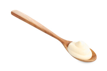 Tasty mayonnaise sauce in wooden spoon isolated on white