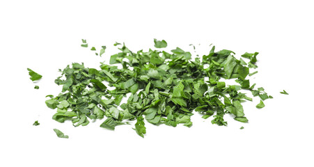 Fototapeta premium Chopped green parsley leaves isolated on white