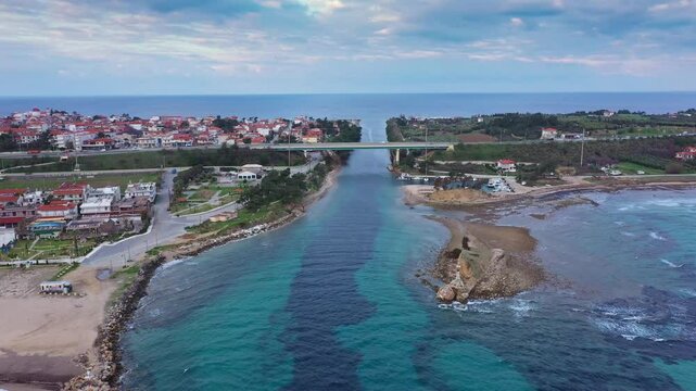 Aerial view at Nea Potidea canal, which connects Toroneos Bay with the Gulf of Thermaikos. Greece, Kassandra, Halkidiki