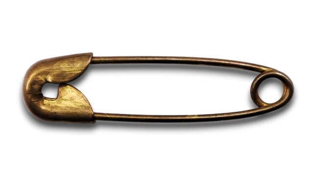 Top view of a closed safety pin, isolated on white background. Safety pin is a simple yet versatile fastening device made of metal, designed to hold fabric or objects together securely.
