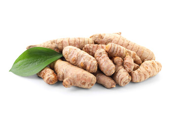 Raw turmeric roots and green leaf isolated on white