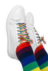 Woman wearing socks in LGBT colors on white background, closeup