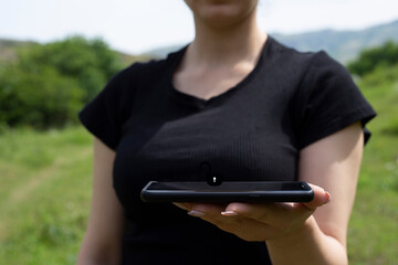 woman hands holding smartphone.