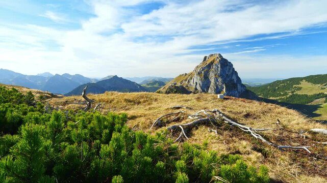 Experience the Tranquility of Autumn in the Mountains with Vibrant Fall Colors, Majestic Peaks, and Fresh Mountain Air for the Ultimate Relaxation and Peaceful Escape