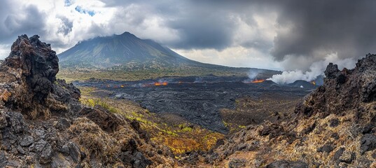 Volcanic Mountain Range with Lava Rivers and Dramatic Cloudy Sky for Nature Prints
