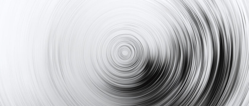 Abstract concentric circles create a hypnotic, swirling pattern.  Light gray tones blend into darker shades to accentuate the circular motion.