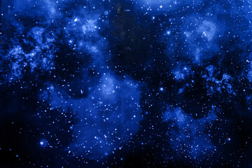 Deep blue cosmic space filled with stars and nebulae