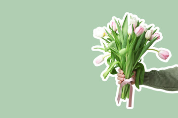 Male hand with bouquet of beautiful tulips on green background. International Women's Day