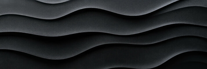 Obraz premium Captivating textures of smooth black sand dunes under soft light in a serene landscape