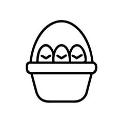 Fototapeta premium Colorful easter basket filled with decorated eggs on a sunny spring day in a garden