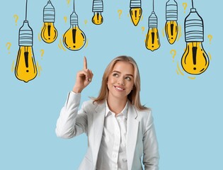 Businesswoman with light bulbs and exclamation marks on blue background