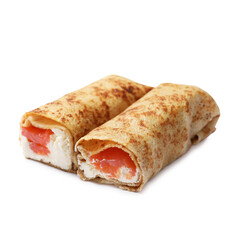 Delicious crepes with salmon and cream cheese isolated on white