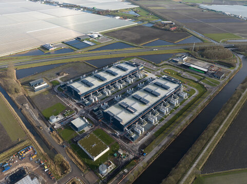 Data center, super computer, quantum computing, storage clouds space and internet infrastructure in the Netherlands, an aerial drone video.