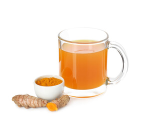 Aromatic turmeric tea in glass cup, roots and powder isolated on white
