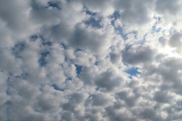 Stratocumulus clouds covered blue sky, natural cloudscape