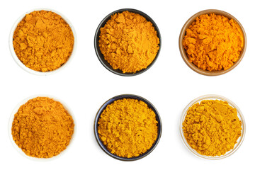 Turmeric powder in bowls isolated on white, set. Top view
