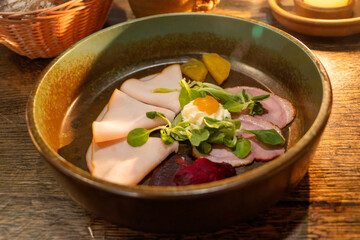 Plate of appetizers in the medieval restaurant of the U Pavouka tavern in the old part of Prague in the Czech Republic.