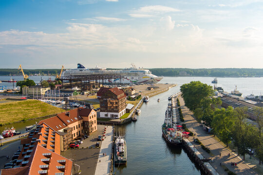 KLAIPEDA, LITHUANIA - JUNE 2022: Aerial view of huge 'Norwegian Dawn' cruise liner in the port of Klaipeda.