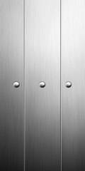 Obraz premium Sleek metallic surface featuring three round knobs arranged evenly across the frame