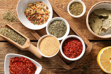 Composition with aromatic spices on wooden table
