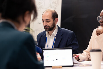 Business team developing corporate branding and reputation management plans, finding ways to build...