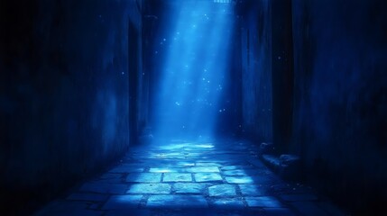 Fototapeta premium A dark blue hallway with a light shining on it