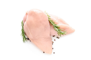 Raw chicken breast with rosemary and peppercorns on white background