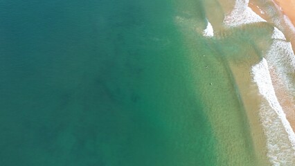Drone shot aerial view of the ocean in summer in Australia 