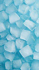 Clear ice cubes scattered on a blue surface creating a refreshing and vibrant texture