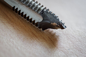 Macro detail of a broken part of a machine tap.
