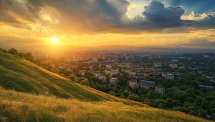 Obraz premium Golden Sunset over Cityscape from Hilltop