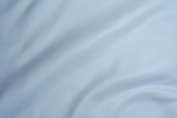 Light blue fabric texture with soft folds