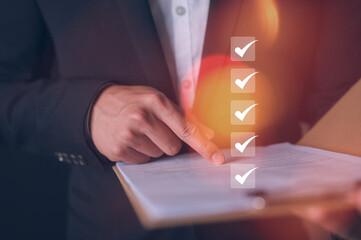 Audition Checklist approval Document data system Report HR technology Concept Businessman holding...