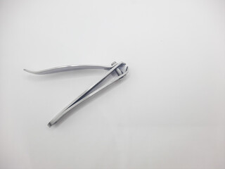 Stainless steel nail clippers with white background 