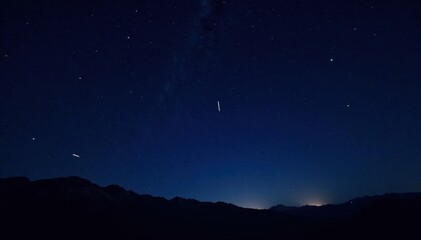 Dark starry night sky with scattered stars and a few shooting stars, astronomy, galaxy, stars