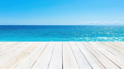 Fototapeta premium Summer ocean view; wooden deck; bright sky; calm sea; travel