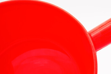 Red plastic water spoon with rubber handle for commercial and household use made in China