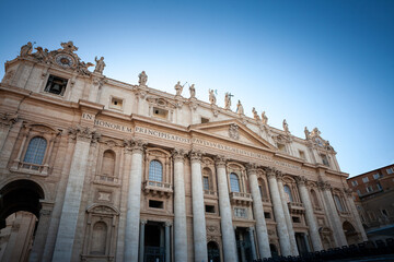 Saint Peter's Basilica in Vatican seenfrom St. Peter's Square. focusing on the iconic facade of the basilica. It's a papal basilica & a major landmark of Rome and Vatican.