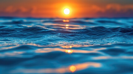 Serene Sunset Over Calm Ocean Waves with Glimmering Reflections and Soft Clouds
