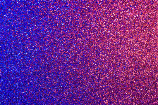Fototapeta A blue and pink background with a lot of glitter