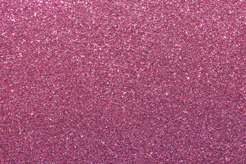Fototapeta premium A pink background with glittery texture