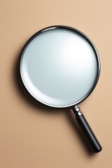 a close up of a magnifying glass on a beige background