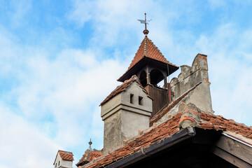 Naklejka premium Historic eastern european church tower against blue sky