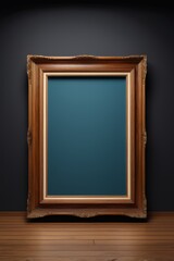 arafed picture frame on a wooden floor against a black wall