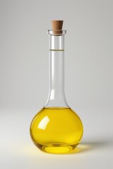 there is a glass bottle with a yellow liquid inside of it