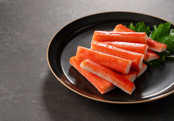 Imitation Crab Sticks on a Black Background