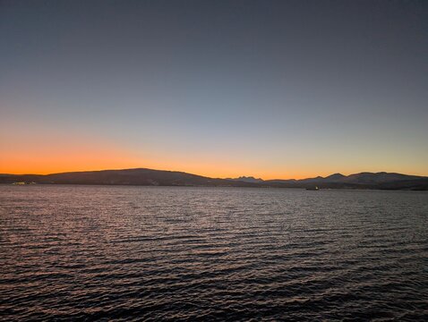 Golden Sunset Reflecting on Ocean Waves - Powered by Adobe