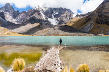 young woman in lagoon of cusco peru