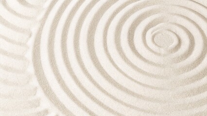 Fototapeta premium Sand pattern as background. A zen pattern in white sand. Beach sand texture in the summer sun. Sea waves and sun glare over the sandy coast. Sand texture background. Wave pattern. 