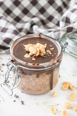 Peanuts butter muse in the glass jar 